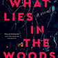 What Lies in the Woods: A Novel