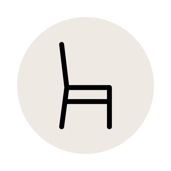 A white background with an icon of a chair, representing a seating area 