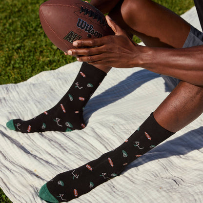 Conscious Step: Socks that Support Youth Sports (Black Footballs)