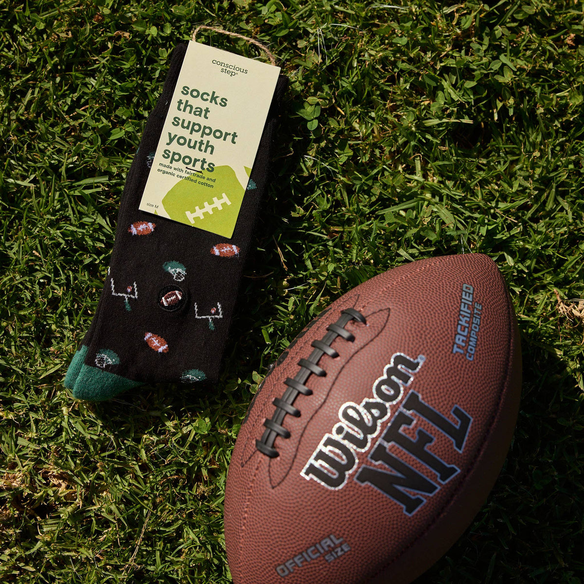 Conscious Step: Socks that Support Youth Sports (Black Footballs)